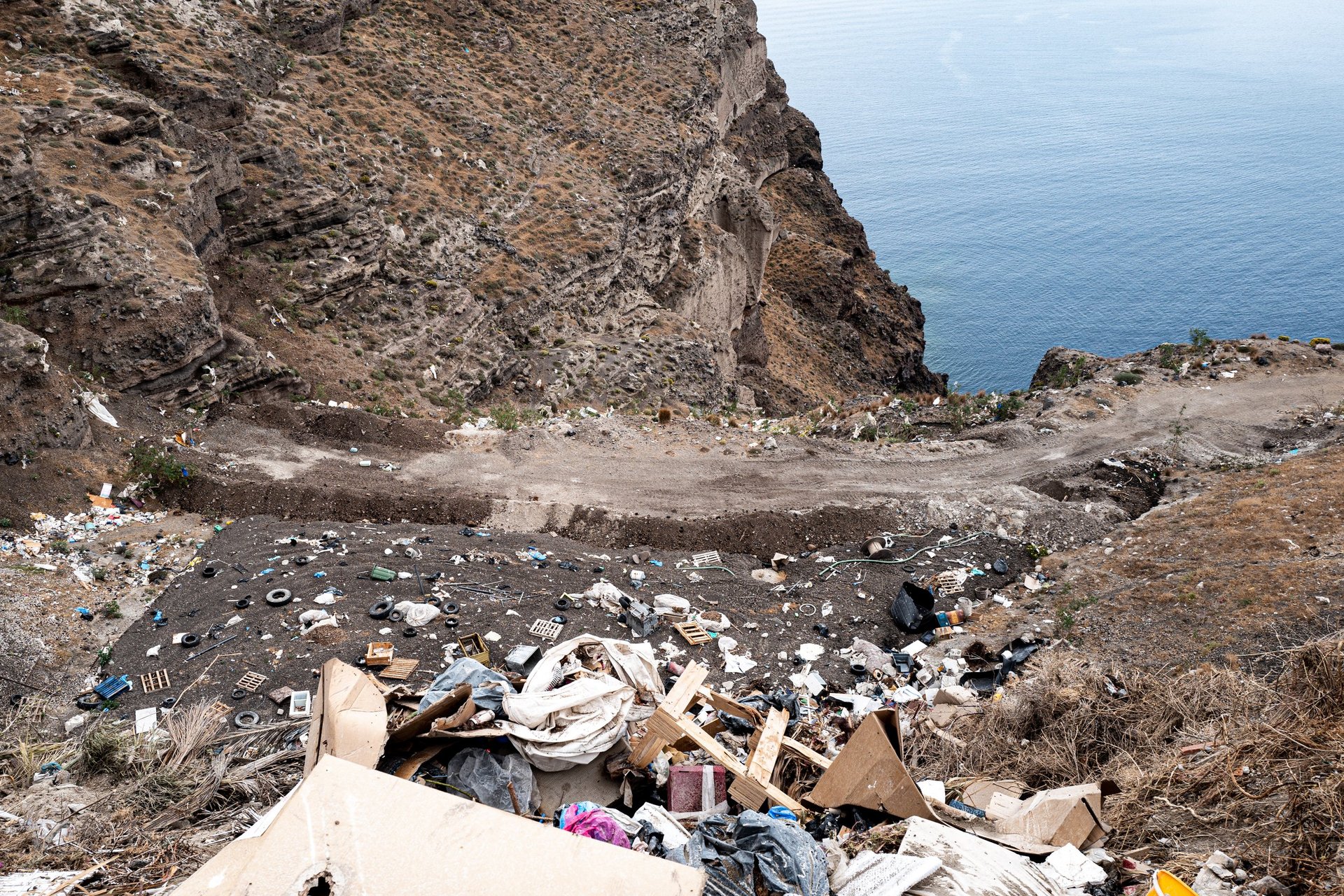 Abandoned cisterns and stone terraces - another Santorini hidden in plain sight